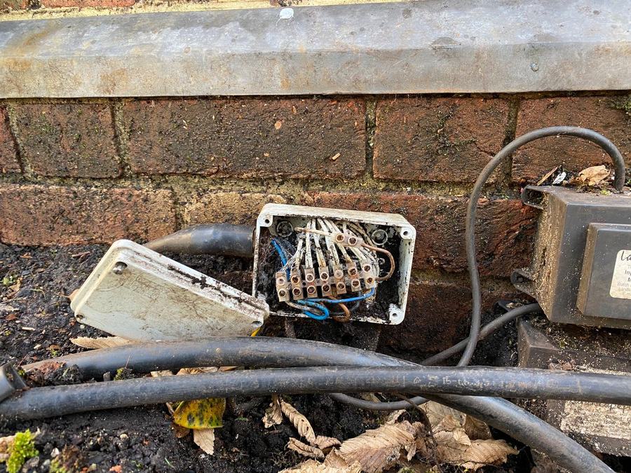 Water damage and poor original wiring before restoration